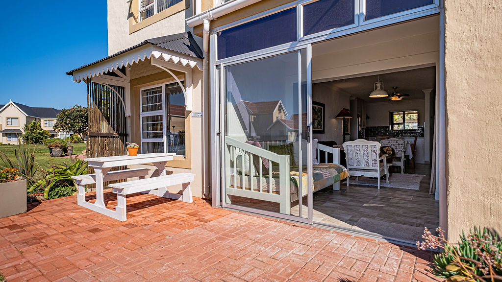 The sliding door leading out to the two bedroom apartment's veranda.