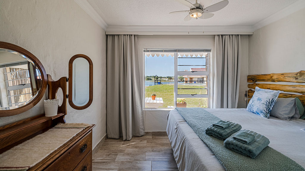 A view onto the marina from the two bedroom apartment's main bedroom.