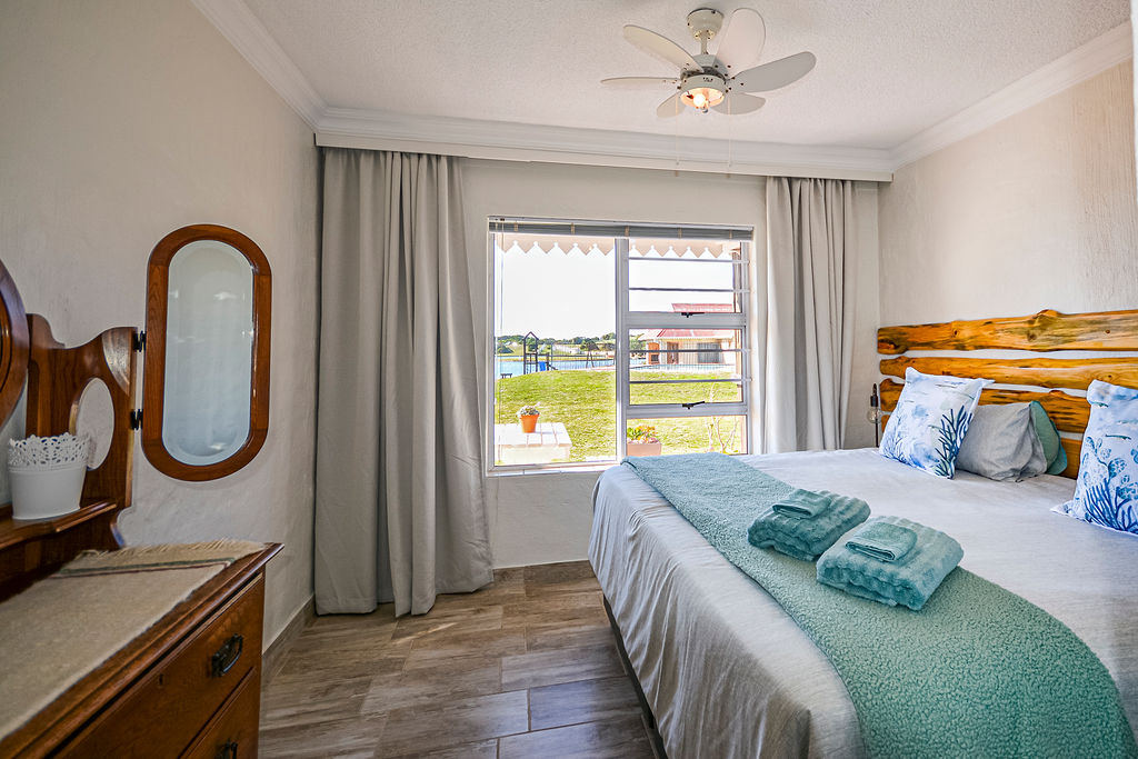 A view onto the marina from the two bedroom apartment's main bedroom.