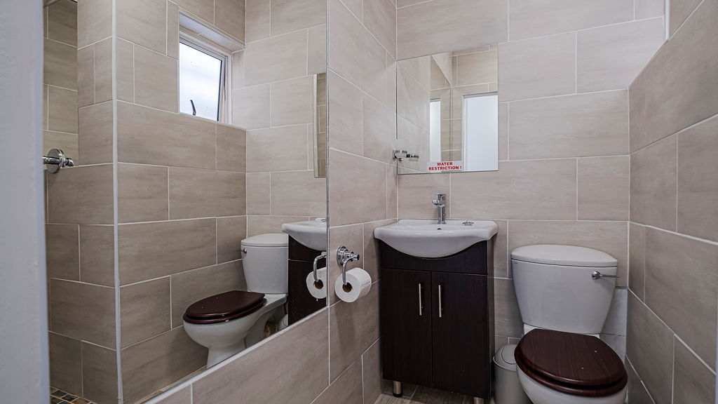 A toilet at the two bedroom apartment.